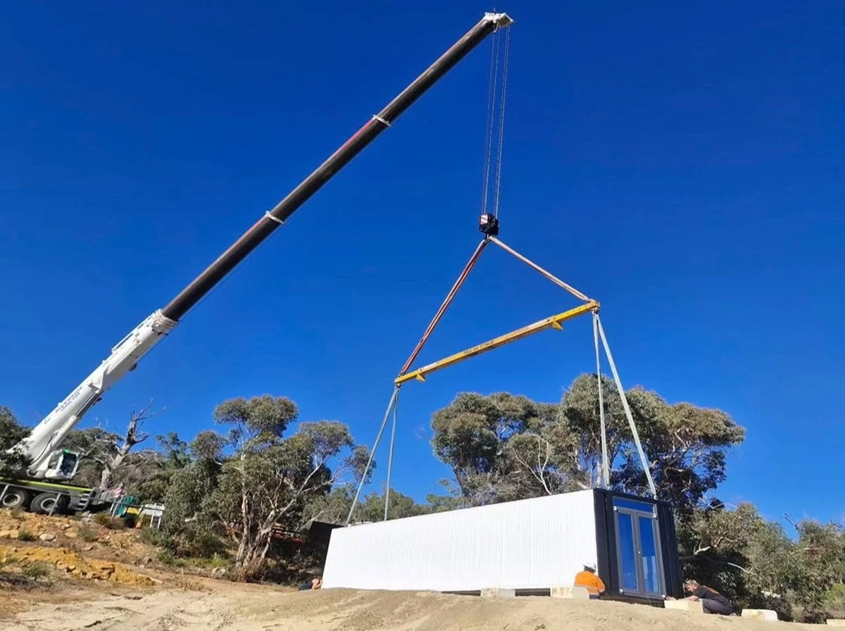 Crane lifting Perth Dynamic Solutions modular home onto site